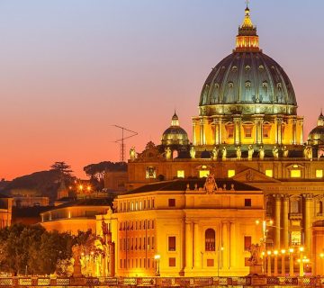 St. Peter's Basilica at sunset in Rome, Italy.