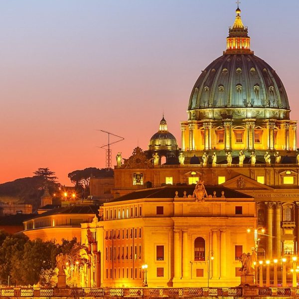 St. Peter's Basilica at sunset in Rome, Italy.