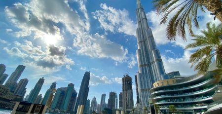 Dubai skyline with Burj Khalifa and palm trees