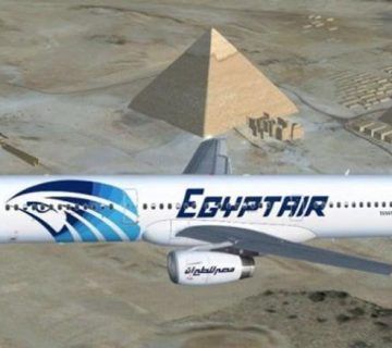 EgyptAir plane flying over the Pyramids of Giza
