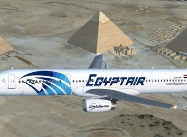 EgyptAir plane flying over the Pyramids of Giza
